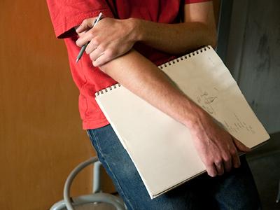 Student holding sketch pad